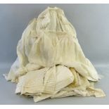 A quantity of Victorian and later clothing, including baby's and children's comprising dresses,