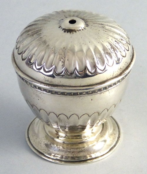 An Edwardian string dispenser, of circular pedestal form with fluted domed lid and half fluted body,