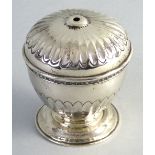 An Edwardian string dispenser, of circular pedestal form with fluted domed lid and half fluted body,