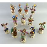 A set of twelve Dresden monkey musicians, comprising conductor, singer, drummer, four playing