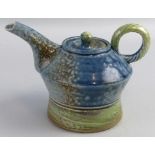 Jane Hamlyn, a salt glazed stoneware teapot and cover of waisted form with rope twist handle in