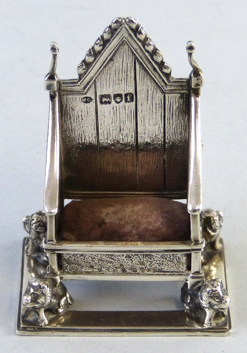 A pin cushion, in the form of the Coronation Chair, 8cm, London 1901, gross wt.2.09ozs