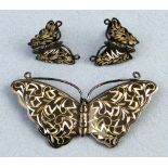 A niello sterling silver brooch, in the form of a butterfly with engraved wings, 6cm wide and the