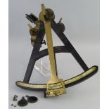 A 19th century ebony and brass vernier octant, the A-shaped frame inset with an ivory scale and