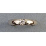 A solitaire diamond ring, the single stone tension set on a 9ct white gold shank, size Q