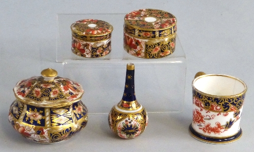 Royal Crown Derby in pattern 1128, miniature bottle vase, small cup and three various lidded