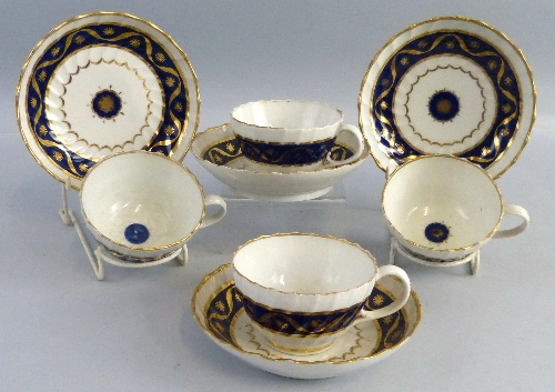 A set of four 19th century Worcester cups and saucers,  each of typical wrythen fluted form