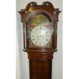 A Victorian longcase clock, the eight day movement striking on a bell having painted arched dial