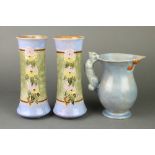 A pair of Royal Doulton waisted vases with stylised flowers 9 1/2" together with an Art Deco