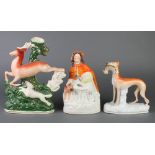 A Staffordshire figure of Little Red Riding Hood 9", a ditto of a hound with a hare in its mouth