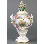 An early 20th Century German porcelain vase with applied flowers and fete gallant views 10"This