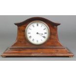 Buren, a Swiss bedroom timepiece with enamelled dial and Roman numerals contained in a mahogany case