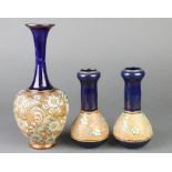 A pair of Doulton Silicon vases with tulip necks 6 1/2", a ditto vase with waisted neck 10" The