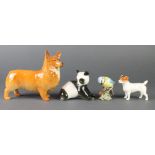 A Beswick figure of a standing Corgi 7", a ditto Jack Russell 3", a Russian figure of a Panda and