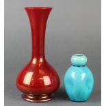 A Burmantofts turquoise dimpled vase  642 4" and a red glazed waisted necked ditto 3009 9"