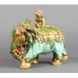 A Victorian Continental Majolica box and cover in the form of a monkey riding an elephant 11"There