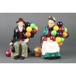 A Royal Doulton figure - The Balloon Man HN1954 7 1/2" and The Old Balloon Seller HN1315 7 1/2"