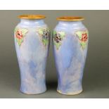 A pair of Royal Doulton oviform vases with floral decoration inscribed Compts of Wor.M and