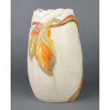 A Clarice Cliff polychrome vase decorated Autumnal leaves 10"