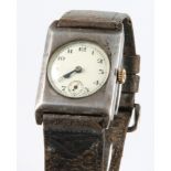 A gentleman's silver cased wristwatch with seconds at 6 o'clock and red 12 together with a