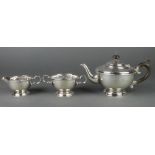 A silver 3 piece tea set with fruitwood handles and beaded decoration, Birmingham 1931, 648 grams