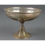 A silver tazza with pierced rim, 88 grams, Birmingham 1922