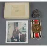 Queen Elizabeth II Special Constabulary medal to William H.Hands in posting box, together with