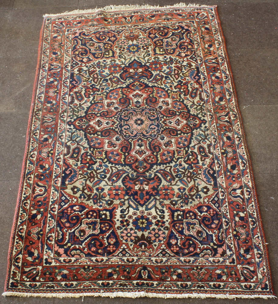 A Persian Tafresh rug 83" x 51"