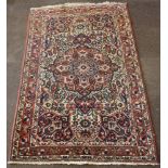 A Persian Tafresh rug 83" x 51"