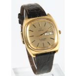 A 1970's gentleman's gold plated Omega Seamaster quartz calendar wristwatch on a leather strap