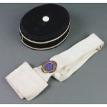 A Boys Brigade pill box hat Mk1, a fabric cross belt and a life boys badge