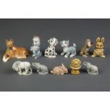 A Goebel figure of a reclining boxer dog 3 1/2" and a quantity of Wade Whimsies