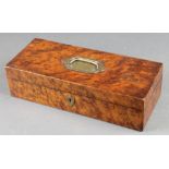 A Victorian rectangular amboyna trinket box with hinged lid and brass countersunk handle 3" x 12"