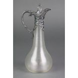 An Edwardian silver plated mounted ewer with Rococo decoration, the bulbous glass body with ribbed