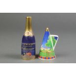 A Royal Worcester candle snuffer to celebrate the Millennium in the form of a champagne bottle 4 1/