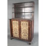 A Regency rosewood chiffonier, the raised back fitted 2 shelves and with columns to the sides