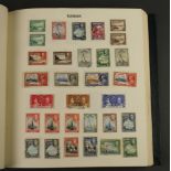 An album of Colonial used stamps including Aiden, Bahamas, Bahawalpur, Bahrain, Barbados, British