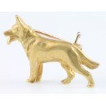 A 9ct gold bar brooch in the form of a standing Alsatian, 6 grams