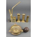 A brass opium pipe, a Trench Art ashtray formed from a 1916 4.5lb shell, 2 shell case vases 4 1/