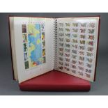 An album of mint GB stamps and first day covers together with an album of American mint and