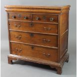 A 17th/18th Century Continental oak chest  with 3 plank top, fitted a secret drawer above 2 short