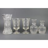 A pair of cut glass celery vases 8", 2 decanters lacking stoppers and a waisted vase