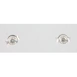 A pair of 18ct gold single stone diamond ear studs, each approx. 0.2ct