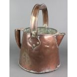 A copper jug with swing handle 9"