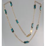 An 18ct gold turquoise set necklace 18"