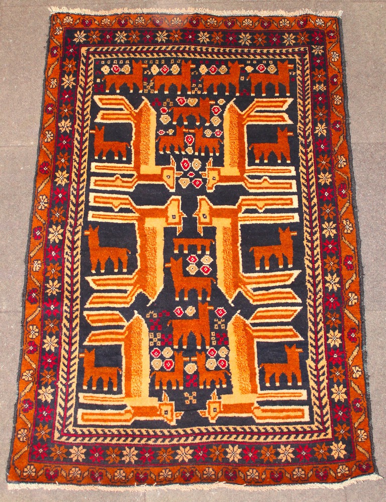 A black ground Persian Herathi rug decorated various animals 56 1/2" x 36"