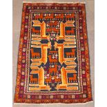 A black ground Persian Herathi rug decorated various animals 56 1/2" x 36"