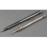 A silver plated Yard o'lead pencil and 1 other
