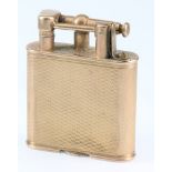 A Dunhill 9ct gold petrol cigarette lighter with engine turned decoration 2" There are some dents to