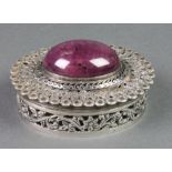 A Continental silver plated pierced oval box with cabochon hardstone mount 4"